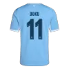 UCL Camiseta DOKU #11 Manchester City 2026/27 Primera Equipación - Versión Hincha - camisetasfutbol